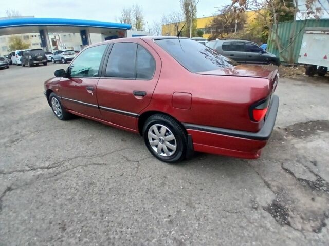Красный Ниссан Примера, объемом двигателя 1.6 л и пробегом 250 тыс. км за 2499 $, фото 2 на Automoto.ua