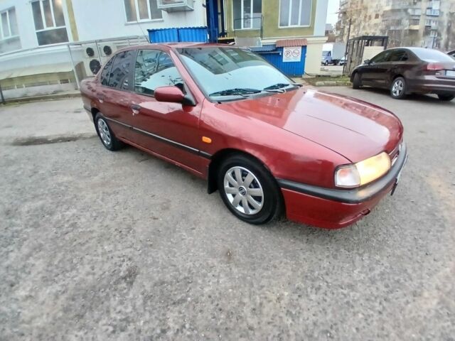 Красный Ниссан Примера, объемом двигателя 1.6 л и пробегом 250 тыс. км за 2499 $, фото 6 на Automoto.ua