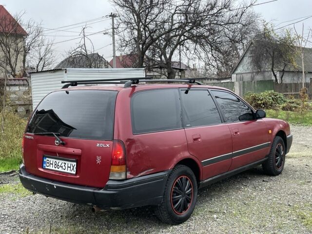 Червоний Ніссан Прімера, об'ємом двигуна 2 л та пробігом 400 тис. км за 1199 $, фото 8 на Automoto.ua