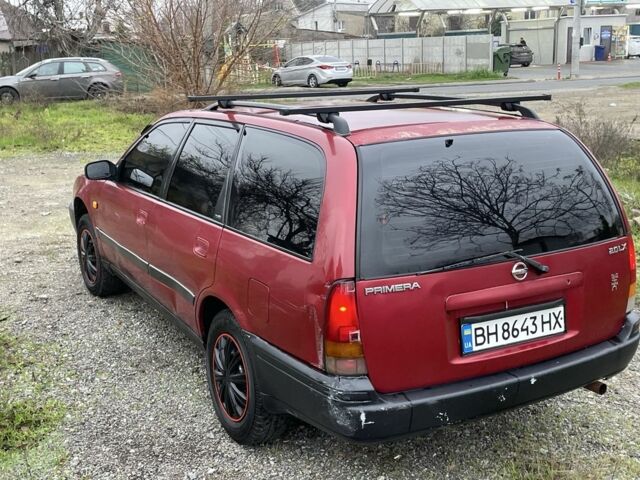 Червоний Ніссан Прімера, об'ємом двигуна 2 л та пробігом 400 тис. км за 1199 $, фото 6 на Automoto.ua