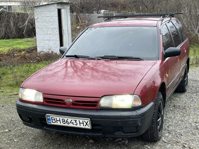 Червоний Ніссан Прімера, об'ємом двигуна 2 л та пробігом 400 тис. км за 1199 $, фото 3 на Automoto.ua