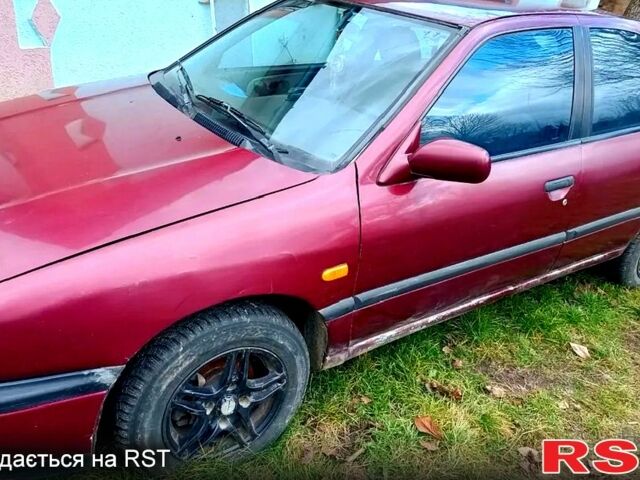 Красный Ниссан Примера, объемом двигателя 2 л и пробегом 350 тыс. км за 700 $, фото 1 на Automoto.ua