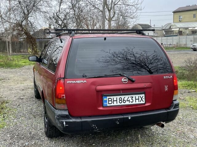 Червоний Ніссан Прімера, об'ємом двигуна 2 л та пробігом 400 тис. км за 1199 $, фото 7 на Automoto.ua