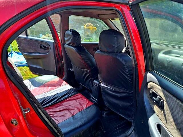 Червоний Ніссан Прімера, об'ємом двигуна 2 л та пробігом 250 тис. км за 1560 $, фото 6 на Automoto.ua