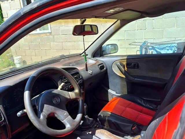 Червоний Ніссан Прімера, об'ємом двигуна 2 л та пробігом 250 тис. км за 1560 $, фото 3 на Automoto.ua