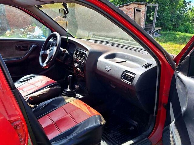 Червоний Ніссан Прімера, об'ємом двигуна 2 л та пробігом 250 тис. км за 1560 $, фото 4 на Automoto.ua