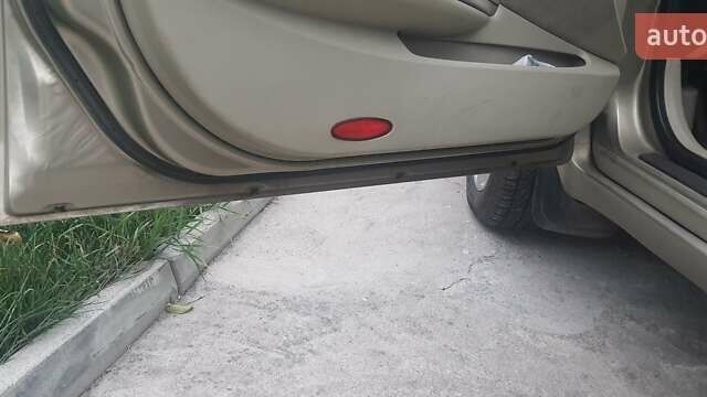 Желтый Ниссан Примера, объемом двигателя 1.6 л и пробегом 281 тыс. км за 4500 $, фото 1 на Automoto.ua