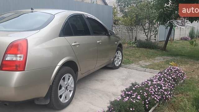 Желтый Ниссан Примера, объемом двигателя 1.6 л и пробегом 281 тыс. км за 4500 $, фото 4 на Automoto.ua