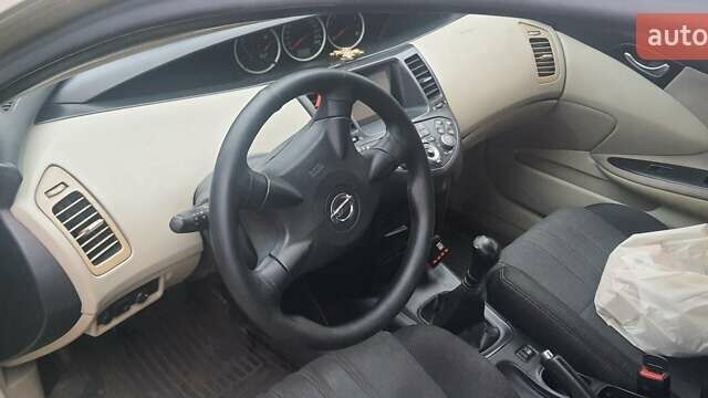 Желтый Ниссан Примера, объемом двигателя 1.6 л и пробегом 281 тыс. км за 4500 $, фото 2 на Automoto.ua