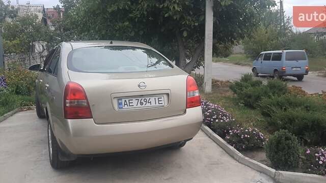 Желтый Ниссан Примера, объемом двигателя 1.6 л и пробегом 281 тыс. км за 4500 $, фото 5 на Automoto.ua