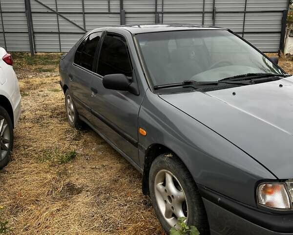 Серый Ниссан Примера, объемом двигателя 2 л и пробегом 350 тыс. км за 1450 $, фото 4 на Automoto.ua