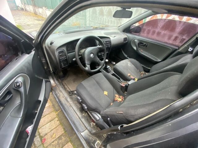 Серый Ниссан Примера, объемом двигателя 2 л и пробегом 198 тыс. км за 476 $, фото 4 на Automoto.ua