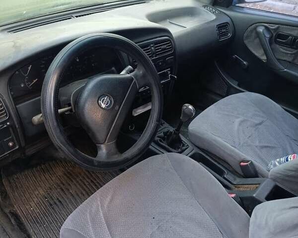 Серый Ниссан Примера, объемом двигателя 2 л и пробегом 658 тыс. км за 800 $, фото 6 на Automoto.ua