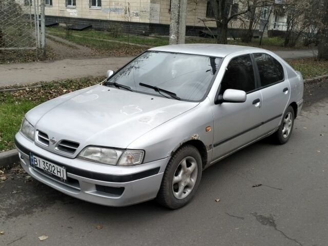 Сірий Ніссан Прімера, об'ємом двигуна 2 л та пробігом 350 тис. км за 2000 $, фото 2 на Automoto.ua