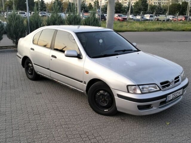 Сірий Ніссан Прімера, об'ємом двигуна 2 л та пробігом 350 тис. км за 2000 $, фото 8 на Automoto.ua