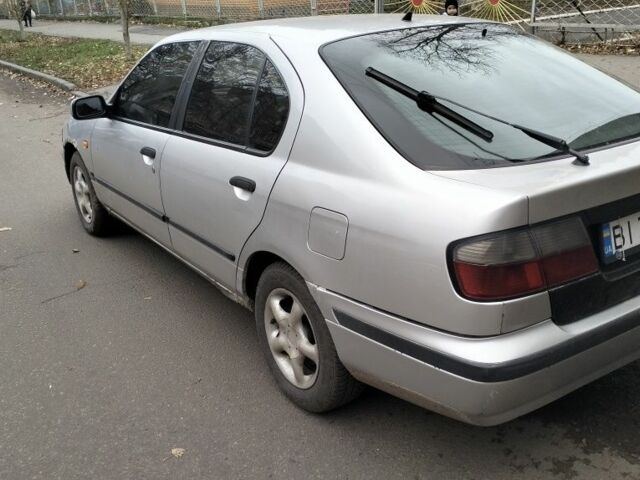 Сірий Ніссан Прімера, об'ємом двигуна 2 л та пробігом 350 тис. км за 2000 $, фото 3 на Automoto.ua