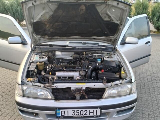 Сірий Ніссан Прімера, об'ємом двигуна 2 л та пробігом 350 тис. км за 2000 $, фото 5 на Automoto.ua