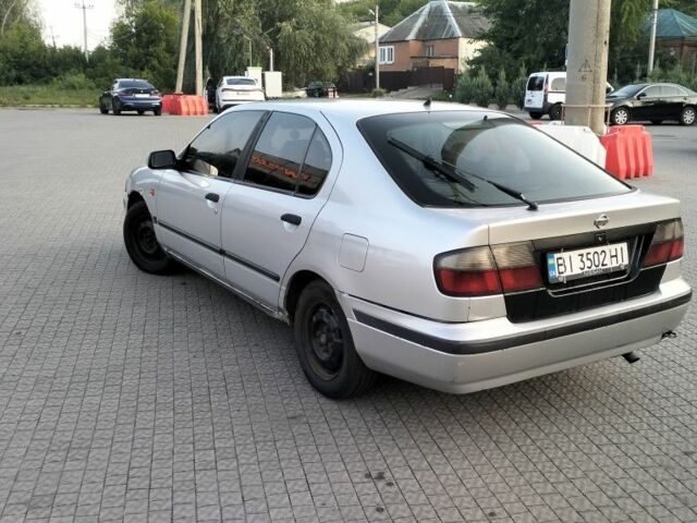 Сірий Ніссан Прімера, об'ємом двигуна 2 л та пробігом 350 тис. км за 2000 $, фото 10 на Automoto.ua