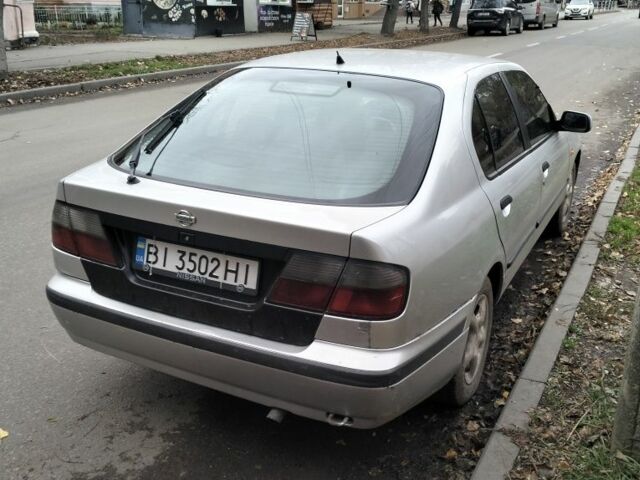 Сірий Ніссан Прімера, об'ємом двигуна 2 л та пробігом 350 тис. км за 2000 $, фото 4 на Automoto.ua