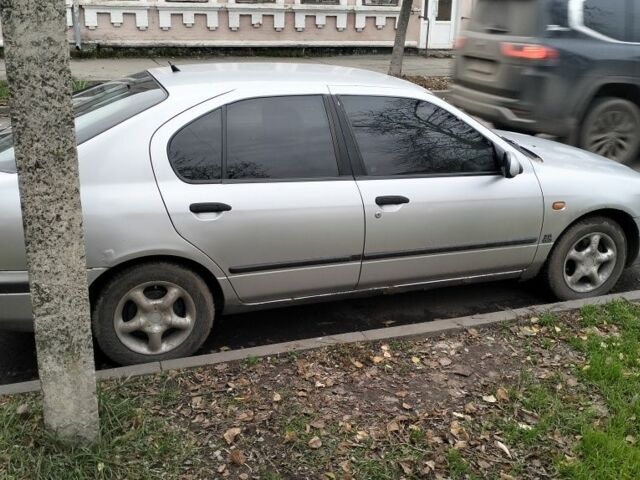 Сірий Ніссан Прімера, об'ємом двигуна 2 л та пробігом 350 тис. км за 2000 $, фото 1 на Automoto.ua