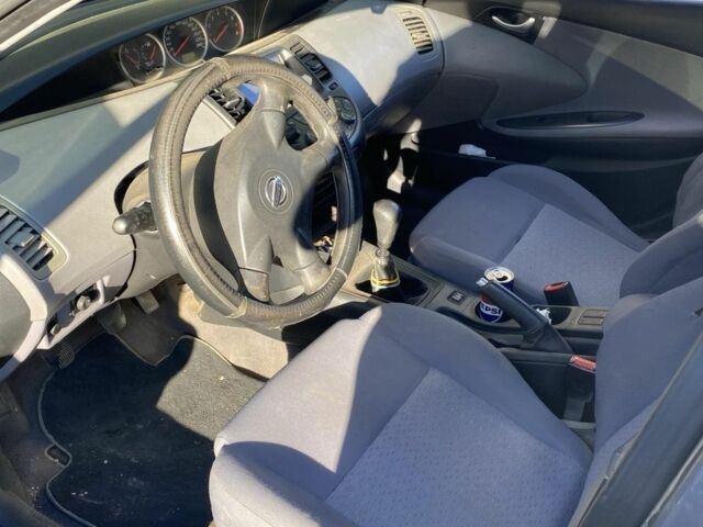 Серый Ниссан Примера, объемом двигателя 1.8 л и пробегом 250 тыс. км за 2500 $, фото 2 на Automoto.ua