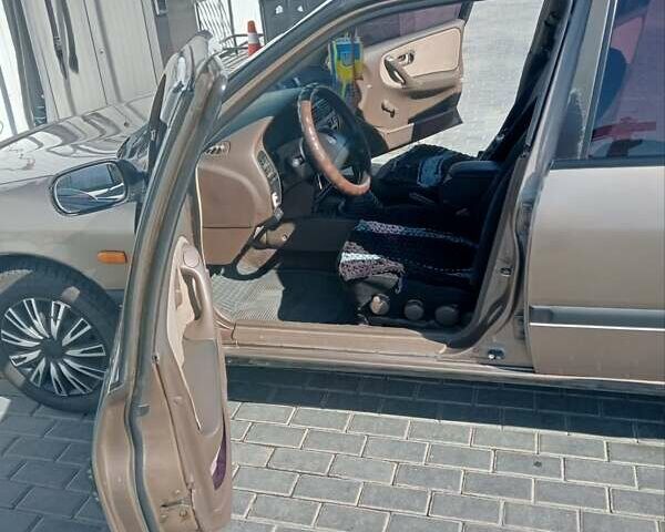 Сірий Ніссан Прімера, об'ємом двигуна 2 л та пробігом 360 тис. км за 1600 $, фото 5 на Automoto.ua