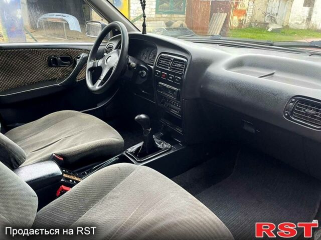 Сірий Ніссан Прімера, об'ємом двигуна 2 л та пробігом 268 тис. км за 1600 $, фото 4 на Automoto.ua