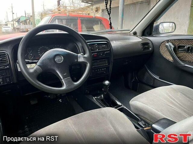 Сірий Ніссан Прімера, об'ємом двигуна 2 л та пробігом 268 тис. км за 1600 $, фото 5 на Automoto.ua