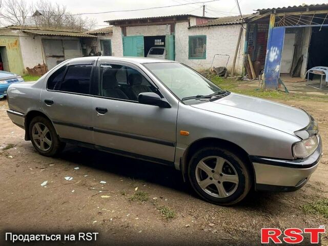 Сірий Ніссан Прімера, об'ємом двигуна 2 л та пробігом 268 тис. км за 1600 $, фото 1 на Automoto.ua