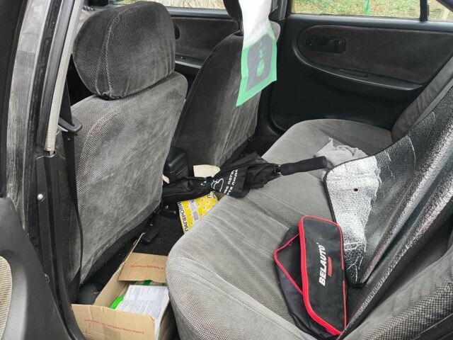 Серый Ниссан Примера, объемом двигателя 1.6 л и пробегом 20 тыс. км за 949 $, фото 4 на Automoto.ua