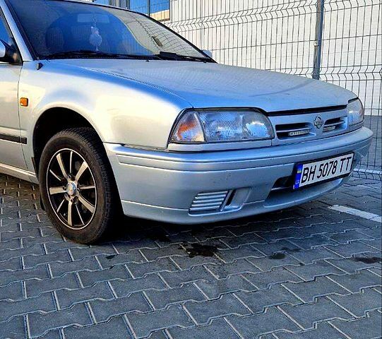 Сірий Ніссан Прімера, об'ємом двигуна 2 л та пробігом 500 тис. км за 2000 $, фото 2 на Automoto.ua