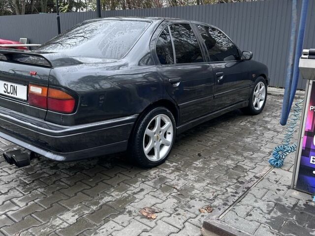 Сірий Ніссан Прімера, об'ємом двигуна 2 л та пробігом 450 тис. км за 2600 $, фото 4 на Automoto.ua