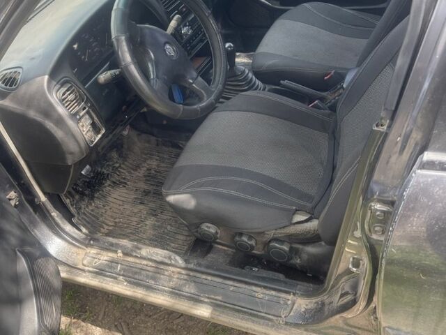 Сірий Ніссан Прімера, об'ємом двигуна 2 л та пробігом 99 тис. км за 1600 $, фото 2 на Automoto.ua