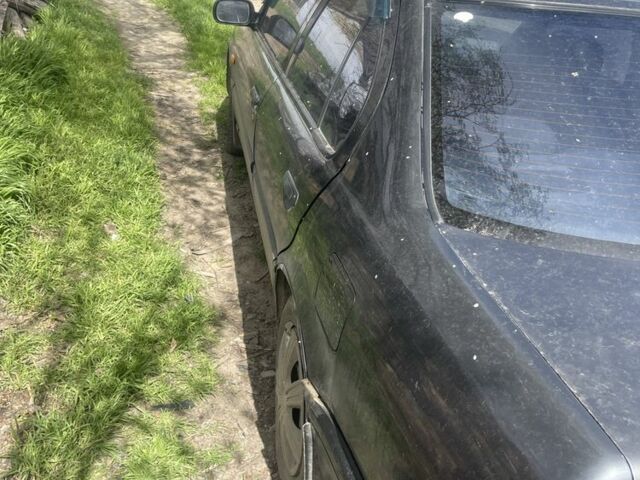 Сірий Ніссан Прімера, об'ємом двигуна 2 л та пробігом 99 тис. км за 1600 $, фото 4 на Automoto.ua