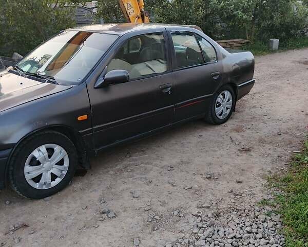 Серый Ниссан Примера, объемом двигателя 1.6 л и пробегом 360 тыс. км за 1550 $, фото 6 на Automoto.ua