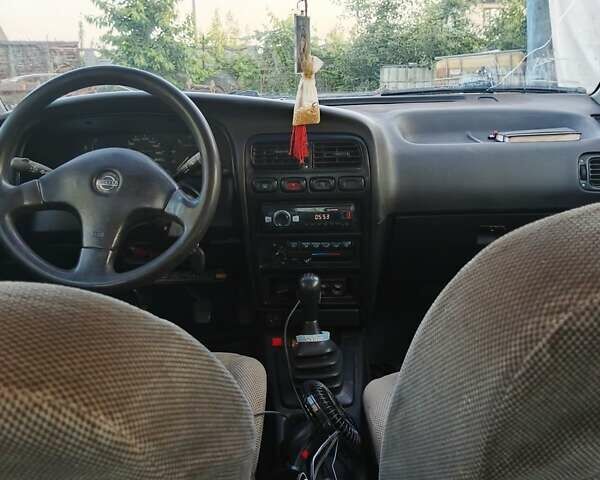 Серый Ниссан Примера, объемом двигателя 1.6 л и пробегом 360 тыс. км за 1550 $, фото 7 на Automoto.ua