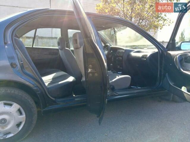 Серый Ниссан Примера, объемом двигателя 2 л и пробегом 400 тыс. км за 1750 $, фото 8 на Automoto.ua