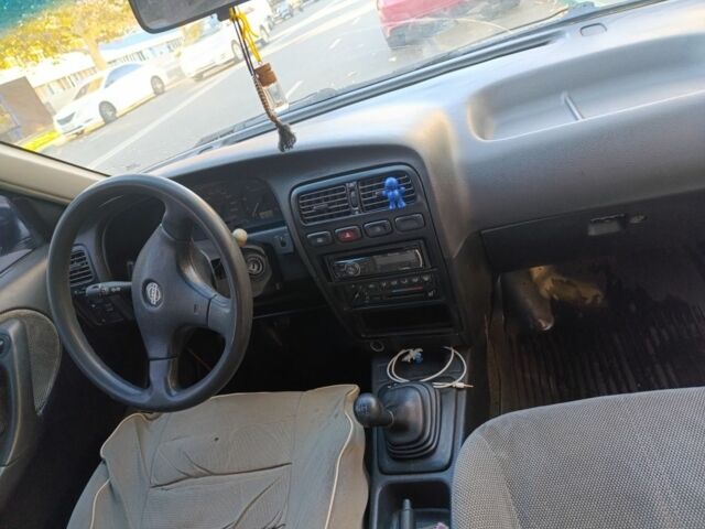 Серый Ниссан Примера, объемом двигателя 2 л и пробегом 1000 тыс. км за 1860 $, фото 6 на Automoto.ua