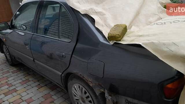 Серый Ниссан Примера, объемом двигателя 1.6 л и пробегом 13 тыс. км за 1000 $, фото 2 на Automoto.ua