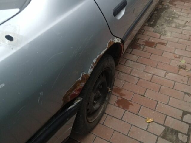 Серый Ниссан Примера, объемом двигателя 2 л и пробегом 350 тыс. км за 709 $, фото 1 на Automoto.ua