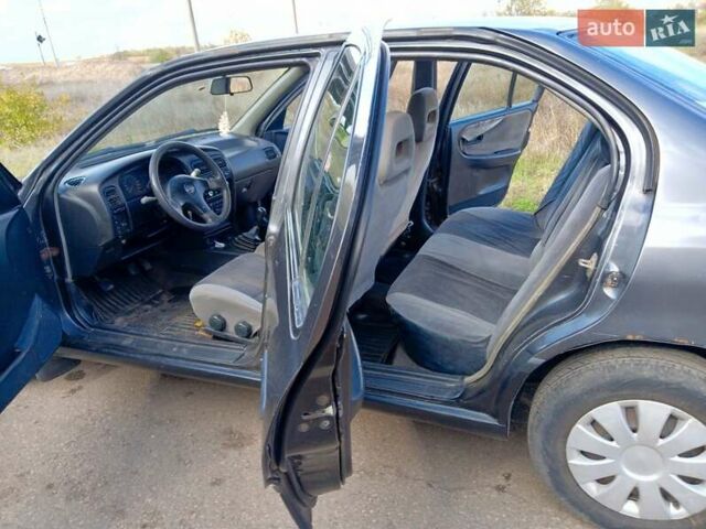 Серый Ниссан Примера, объемом двигателя 2 л и пробегом 400 тыс. км за 1750 $, фото 11 на Automoto.ua