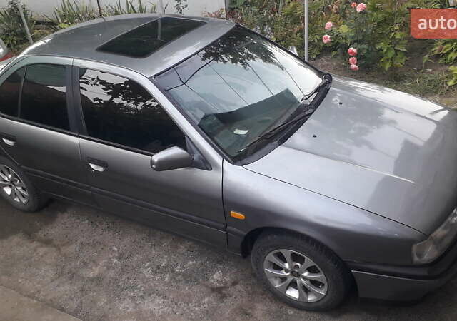 Сірий Ніссан Прімера, об'ємом двигуна 1.6 л та пробігом 340 тис. км за 2100 $, фото 13 на Automoto.ua