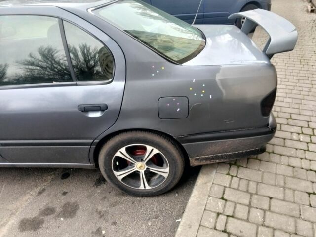 Серый Ниссан Примера, объемом двигателя 1.6 л и пробегом 274 тыс. км за 1900 $, фото 6 на Automoto.ua