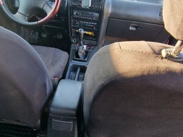 Серый Ниссан Примера, объемом двигателя 1.6 л и пробегом 300 тыс. км за 1500 $, фото 6 на Automoto.ua