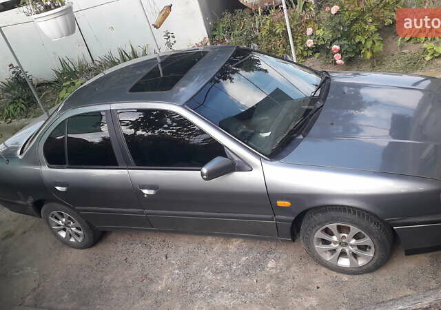 Сірий Ніссан Прімера, об'ємом двигуна 1.6 л та пробігом 340 тис. км за 2100 $, фото 1 на Automoto.ua