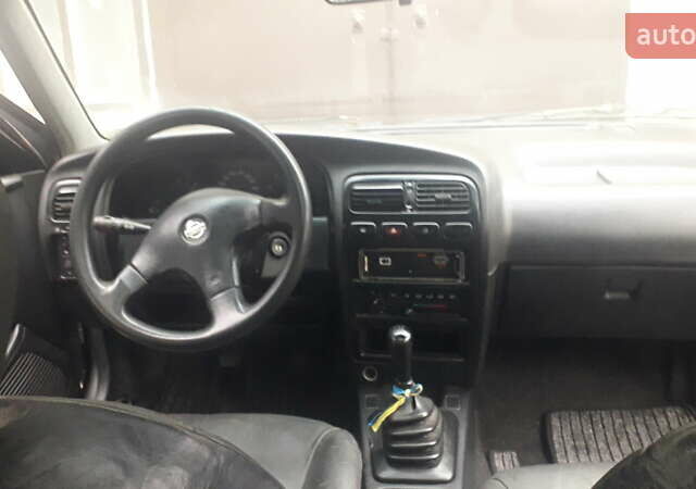 Сірий Ніссан Прімера, об'ємом двигуна 1.6 л та пробігом 340 тис. км за 2100 $, фото 12 на Automoto.ua