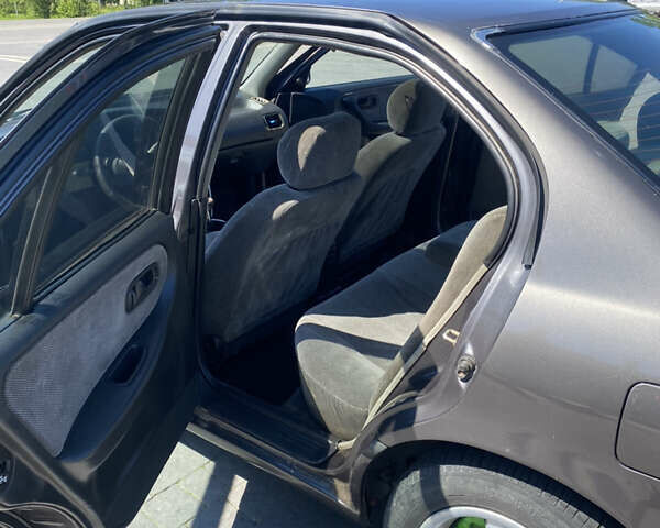 Сірий Ніссан Прімера, об'ємом двигуна 2 л та пробігом 354 тис. км за 1400 $, фото 2 на Automoto.ua