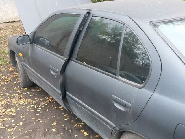 Сірий Ніссан Прімера, об'ємом двигуна 2 л та пробігом 300 тис. км за 1000 $, фото 3 на Automoto.ua