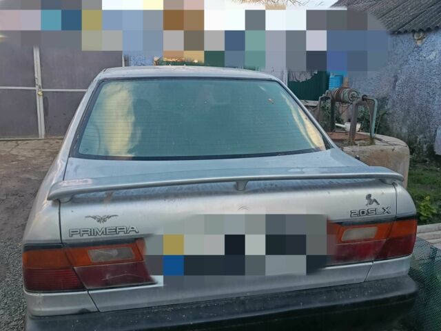 Серый Ниссан Примера, объемом двигателя 2 л и пробегом 355 тыс. км за 700 $, фото 1 на Automoto.ua