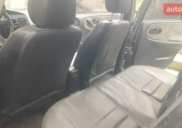 Сірий Ніссан Прімера, об'ємом двигуна 1.6 л та пробігом 340 тис. км за 2100 $, фото 10 на Automoto.ua
